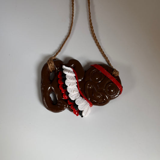 Hei Tiki – Kākahu