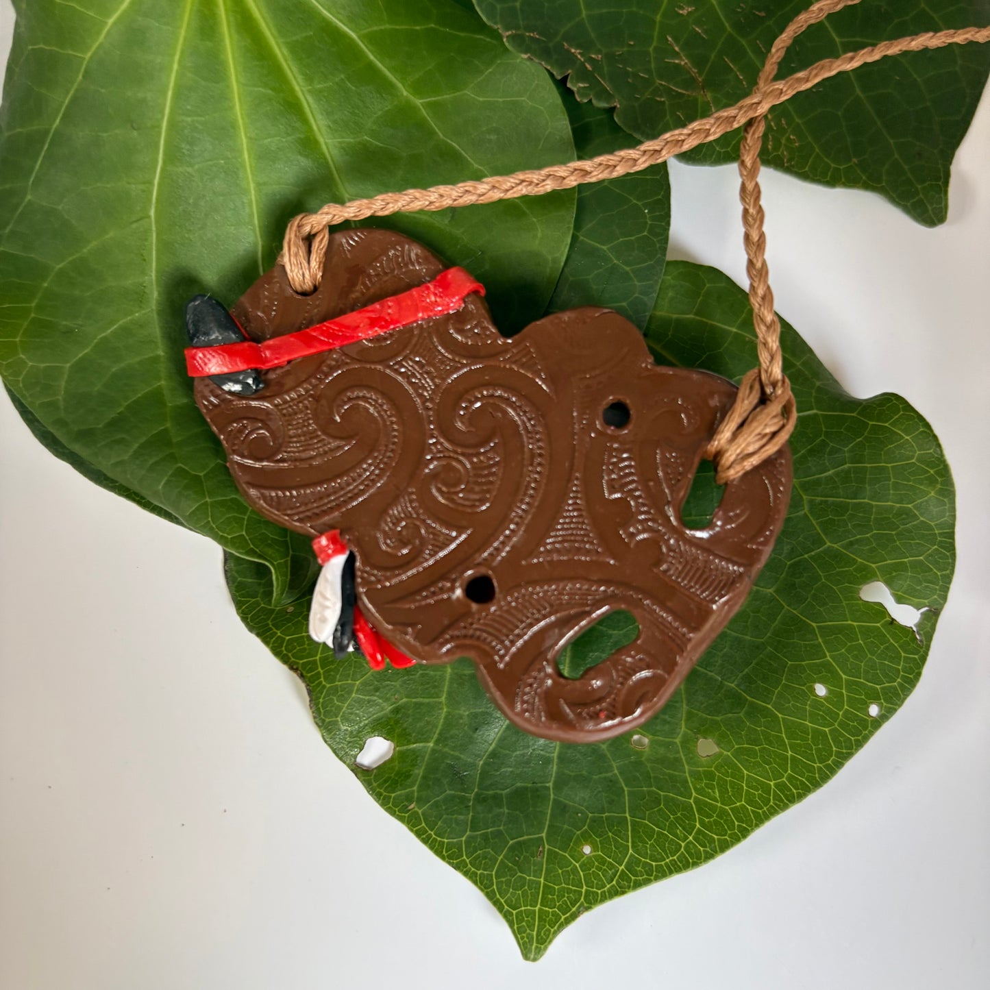 Hei Tiki – Kākahu